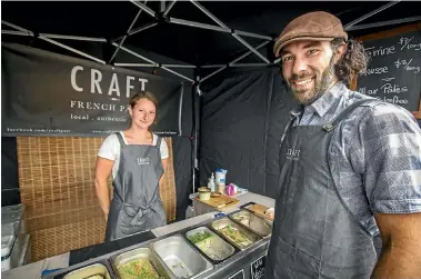  ??  ?? Anne Karschunke and Benoit Gourgues, of Craft French Pates, at their Nelson Saturday Market stall.