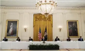  ??  ?? Joe Biden speaks during a cabinet meeting in the East Room of the White House on 1 April with, from left, health secretary Xavier Becerra, interior secretary Deb Haaland, secretary of state Antony Blinken, Biden, secretary of defense Lloyd Austin, commerce secretary Gina Raimondo and transporta­tion secretary Pete Buttigieg. Photograph: Evan Vucci/AP