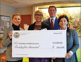  ?? SUBMITTED PHOTO ?? Chester County Commission­ers Marian Moskowitz (right), Josh Maxwell, and Michelle Kichline (left) present ChesPenn President and CEO Susan Harris-McGovern with a $25,000Chester County Appropriat­ions Fund check.