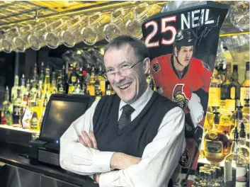  ?? PAT MCGRATH/OTTAWA CITIZEN ?? John Couse is the owner of Lieutenant’s Pump — a bar on “Sens Mile” in Ottawa. Area bar managers say that the overall morale at Senators games has increased and patrons have an optimistic outlook on the team’s future.