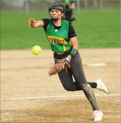  ?? Photos by Ernest A. Brown ?? North Smithfield junior pitcher Vanessa Venkataram­an (above) struck out six Saints in a complete-game effort to lead the Northmen to a 7-5 win over St. Raphael Tuesday. North Smithfield’s Jill DePari (bottom left) makes contact with a pitch, while...