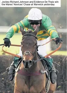  ??  ?? Jockey Richard Johnson and Evidence De Thaix win the Mares’ Novices’ Chase at Warwick yesterday