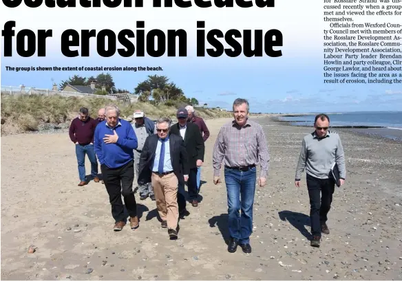  ??  ?? The group is shown the extent of coastal erosion along the beach.