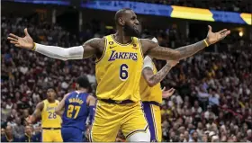  ?? AARON ONTIVEROZ — THE DENVER POST ?? LeBron James (6) of the Los Angeles Lakers looks for a referee to call a foul on Jamal Murray (27) of the Denver Nuggets after the play during the fourth quarter of the Nuggets’ 132-126win at Ball Arena in Denver on Tuesday, May 16, 2023.