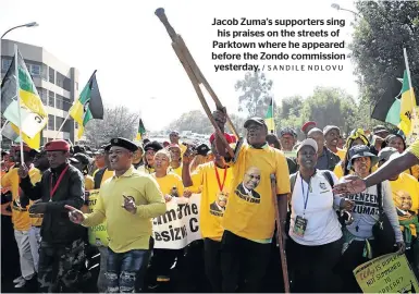  ?? / SANDILE NDLOVU ?? Jacob Zuma’s supporters sing his praises on the streets of Parktown where he appeared before the Zondo commission yesterday.