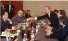  ??  ?? Baker shakes hands with the foreign minister, Tariq Aziz, in Geneva in 1991, shortly before the start of the Gulf war. Photograph: Martin Rutschi/EPA