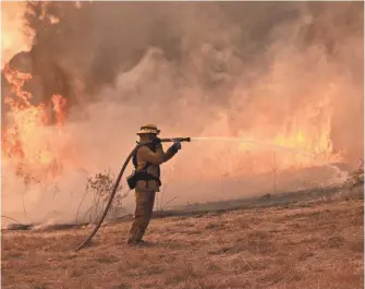  ?? JASON BEAN, USA TODAY NETWORK ?? Almost 200,000 acres have gone up in flames, with no relief in sight.