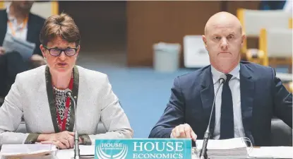  ?? U- TURN: CBA Chairman Catherine Livingston­e and CEO Ian Narev at this year’s House of Representa­tives hearing. ??