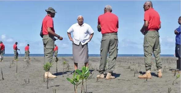  ??  ?? Prime Minister Voreqe Bainimaram­a with officers of the Republic of Fiji Military Forces at the Nasese Foreshore on June 20, 2020.