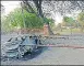  ?? HT PHOTO ?? The car collided with Qutub n
Minar’s boundary wall and caught fire on May 4.