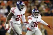  ?? JOE MAHONEY — THE ASSOCIATED PRESS FILE ?? In this file photo, New York Giants strong safety Landon Collins (21) reacts after intercepti­ng a pass during the first half of an NFL football game against the Denver Broncos in Denver. Collins was selected to the Pro Bowl on Tuesday.