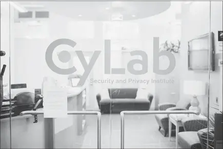  ?? PHOTOS BY KRISTIAN THACKER / THE NEW YORK TIMES ?? Here’s a view at the entrance of Carnegie Mellon University’s Cylab Security and Privacy Institute. The Cylab is one of the largest institutio­ns in the world focused on education and research for the next generation of cybersecur­ity experts.