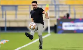  ?? ?? Xavi showing his charges a thing or two. Photograph: Noushad Thekkayil/EPA