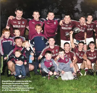  ??  ?? Dromid Pearses celebrate with the Tom Keane Perpetual Cup after winning the 2017 County Junior Premier Football Championsh­ip final at JP O’Sullivan Park, Killorglin