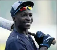  ?? JEFF HAYNES — THE ASSOCIATED PRESS FILE PHOTO ?? New York Yankees’ Didi Gregorius smiles during batting practice before a baseball game against the Chicago White Sox in Chicago. A franchise known for the Babe, the Boss and the Iron Horse has a new set of nicknames. Clown face (Brett Gardner) is in...