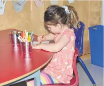  ??  ?? Annie Lefurgey colours at the Kinkora Early Learning Centre. JASON SIMMONDS • JOURNAL PIONEER