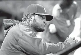  ?? AP/JEFF ROBERSON ?? St. Louis Cardinals catcher Yadier Molina, along with his older brother Jose and wife Wanda, brought food, water and other supplies to Puerto Rico to help with recovery efforts from Hurricane Maria.