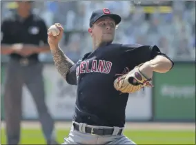  ?? NAM Y. HUH - THE ASSOCIATED PRESS ?? Cleveland Indians starting pitcher Zach Plesac throws against the Chicago White Sox during the first inning of a baseball game in Chicago, Saturday, Aug. 8, 2020.