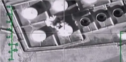  ??  ?? This photo made from the footage taken from Russian defense ministry’s official website yesterday shows fuel tanks hit during an attack by Russian warplanes in Syria. —AP