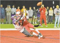  ?? ?? Spalding’s Tyler Brown breaks up a pass to Gonzaga’s Nate Kurisky in overtime Friday.