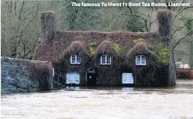  ??  ?? > The famous Tu Hwnt I’r Bont Tea Room, Llanrwst