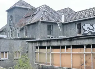  ??  ?? The aftermath of a deliberate fire at the old Mountain Ash Hospital