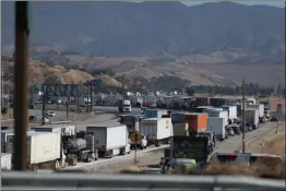  ?? Gilbert Bernal/ The Signal ?? A fatal crash involving a pickup truck and a big rig caused traffic on northbound Interstate 5, in between Hasley Canyon Road and Parker Road, in Castaic Wednesday.