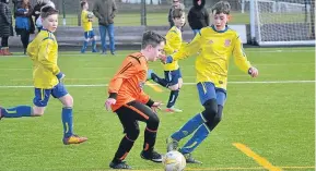  ??  ?? Age 12 DUSC (tangerine) played Dundee West a fortnight ago and face them again on Sunday.