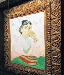  ?? REUTERS ?? “L’arlesienne, Madame Ginoux”, a painting by Vincent Van Gogh, is displayed at an auction house. The painting is part of a series of five oils that Van Gogh executed in 1890 as an homage to French painter Paul Gauguin. A letter co-penned by the two artists was purchased this week by the Vincent van Gogh Foundation.