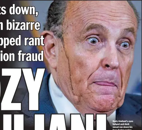  ??  ?? Rudy Giuliani’s eyes bulged and dark sweat ran down his face during raging press conference in Washington, D.C., Thursday.