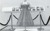  ?? KATIE VASQUEZ AP ?? A dress worn by Judy Garland in the ‘Wizard of Oz,’ discovered last year at Catholic University of America.