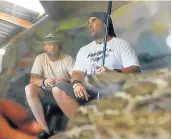  ?? Picture: SUPPLIED ?? FOR A GOOD CAUSE: ‘Survivor SA: Philippine­s winner’ Tom Swartz, left, spent 25 minutes in an enclosure with 15 rattlesnak­es at the Venom Pit Snake Park. Accompanyi­ng him for safety was Venom Pit curator, Juan Marmillier.