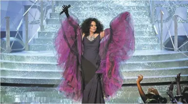  ?? KEVIN WINTER/GETTY IMAGES ?? Diana Ross was a vision in purple at the AMAs Sunday night.