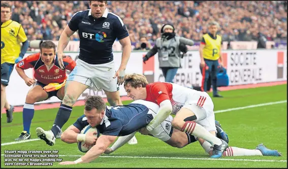  ??  ?? Stuart Hogg crashes over for Scotland’s first try but there was no be no happy ending for Vern Cotter’s Braveheart­s