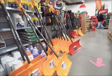  ?? Brian A. Pounds / Hearst Connecticu­t Media ?? Ace Hardware by Haynes in Oxford had snow shovels for sale Tuesday ahead of the snowstorm that is expected to begin Wednesday evening and extend into Thursday.