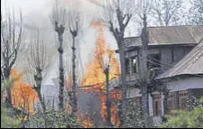  ?? WASEEM ANDRABI/HT ?? A house goes up in flames during a gunbattle in Shopian, around 50 km from Srinagar, on Sunday.