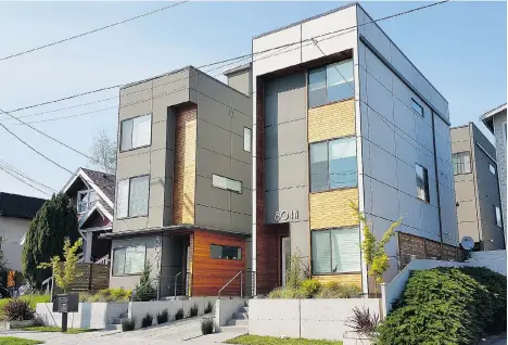  ??  ?? This example of a Seattle ‘four-pack’ places four townhouses on what was a single family lot. Vehicle access is from a paved middle auto-court.