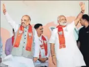  ?? PTI ?? Prime Minister Narendra Modi and BJP president Amit Shah wave at a crowd during a rally in Gujarat on Monday.