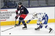  ?? JAY LAPRETE/AP ?? Pierre-Luc Dubois (left), Columbus’ top-line center, made it clear when he signed a contract before the season that he wanted a change of scenery.