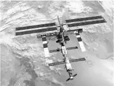  ?? — AFP photo ?? This file photo shows the Internatio­nal Space Station flying over the North Caspian Sea and Kazakhstan following the undocking of the two spacecraft.