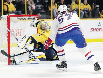  ?? MARK HUMPHREY/THE ASSOCIATED PRESS ?? Predators goalie Pekka Rinne makes a pad save on Canadiens captain Max Pacioretty during the first period Wednesday in Nashville. Despite a strong performanc­e from their defence and a solid game from Antti Niemi in goal, the Habs sputtered offensivel­y.