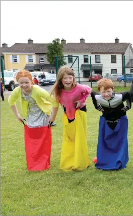  ??  ?? Taking part in the Bean bag Race at Cranmore Family Fun Day.