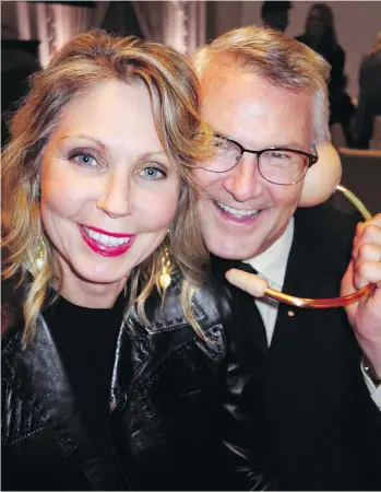  ?? PHOTOS: MALCOLM PARRY ?? Contempora­ry Art Gallery director Jan Ballard had realtor-husband Mark demonstrat­e a “Freudian Snore Analyzer” by artist Mike Bourscheid that gala-auction attendees got to take home.