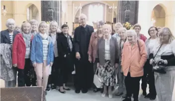  ??  ?? Members of Herrington WI with Father Matthew during an outing to Ampleforth Abbey and Orchard in North Yorkshire.