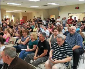  ??  ?? About 125people turned out Wednesday to protest the village of Corinth’s decision to discontinu­e sheriff’s patrols dedicated to the village.