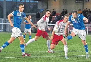  ?? ?? Stranraer’s Dean Hawkshaw clears the danger from this Spartans attack.