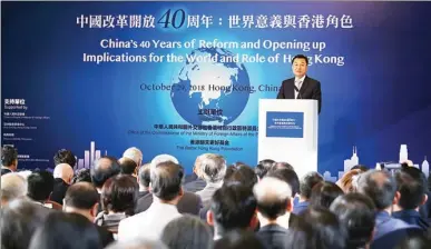  ?? PARKER ZHENG / CHINA DAILY ?? Xie Feng, commission­er of the Ministry of Foreign Affairs in the Hong Kong SAR, delivers a speech during the forum “China’s 40 Years of Reform and Opening-up — Implicatio­n for the World and Role of Hong Kong” in Admiralty on Monday.