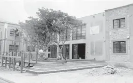  ??  ?? Workers build an outdoor deck at the First Evangelica­l Lutheran Church in Fort Lauderdale.