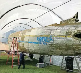  ?? [PHOTOS PROVIDED BY COMPASS AVIATION GROUP] ?? A C-47 that flew on D-Day during World War II will be on permanent display at the Midwest City Veteran’s Memorial. Restoratio­n work included new paint and sheet metal replacemen­t for the 73-year-old plane.