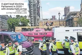  ?? JAMIE LOWE/ EXTINCTION REBELLION ?? A giant boat blocking Parliament in 2020 – with Amelia Halls on top